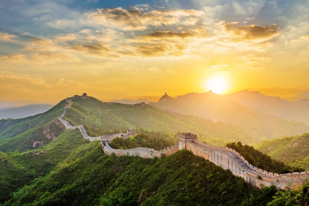 The Great Wall of China at sunset. Famous travel destinations in China. Asia, holiday
