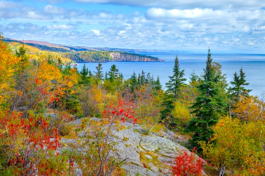 Cliffs and trees in fall color along Lake Superior during autumn