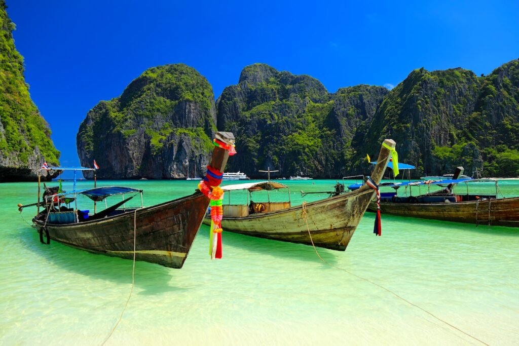 Long tail wooden boats moored at Maya Bay-Phi Phi Islands-Thailand