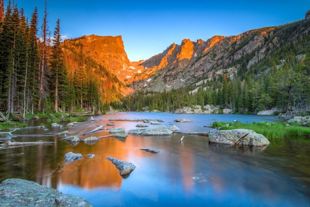 Alpenglow kisses Hallet Peak in Rocky Mountain National Park From Mountains to Beaches: Ultimate Vacations american summer