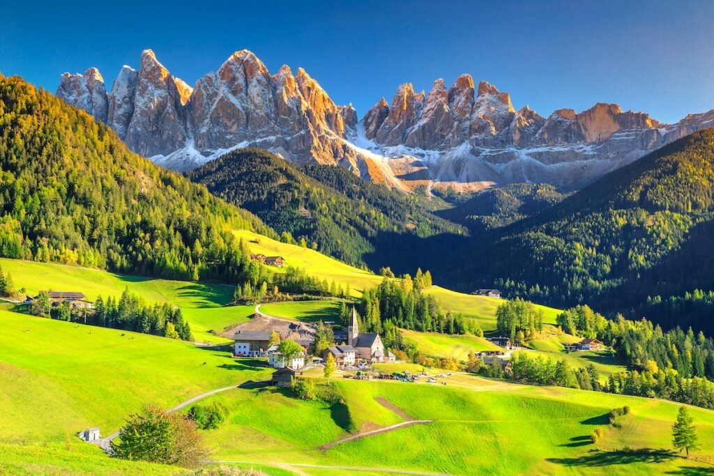 Famous best alpine place of the world, Santa Maddalena village with magical Dolomites mountains in background, Val di Funes valley, Trentino Alto Adige region, Italy, Europe