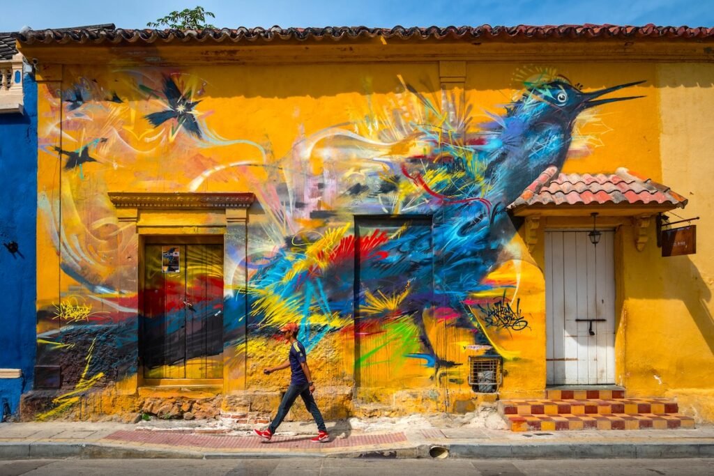 Cartagena, Colombia - Colourful murals in the Getsemini neighbourhood of Cartagena de Indias, Colombia. Discover More With Less Hassle: Ultimate Travel Itinerary You Need