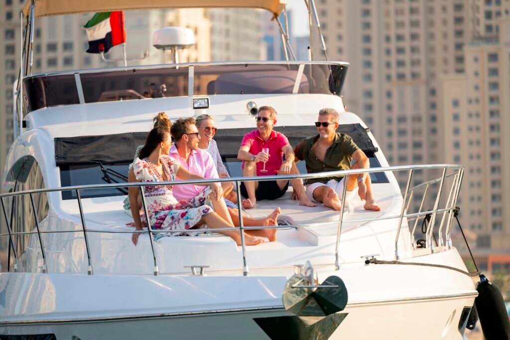Mature adult and mid adult expatriates in the United Arab Emirates enjoying relaxing weekend on private yacht Luxury in the Heart: Best Central City Escapes for 2025