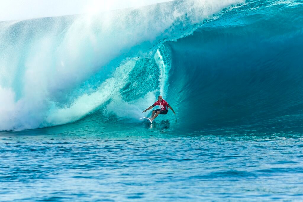 Tahiti, French Polynesia, -Surfer Kelly Slater Surfing 2014 Billabong Pro Tahiti in Teahupoʻo Beach.