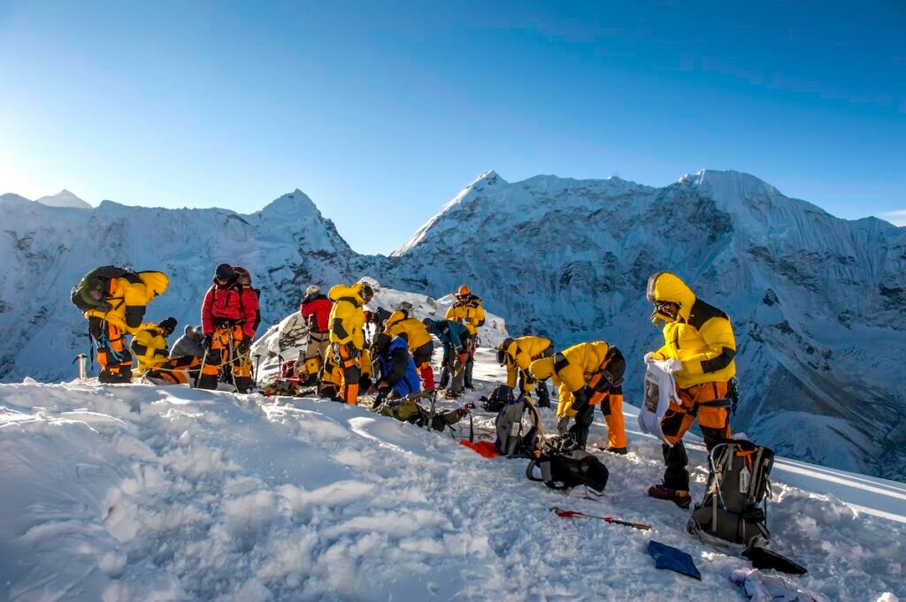 Island Peak,Nepal-April 07,2012:The Climbers are preparing equipment before to climb the Island Peak (Imja Tse) summit(6189m) in the Himayalas Everest region,Nepal.