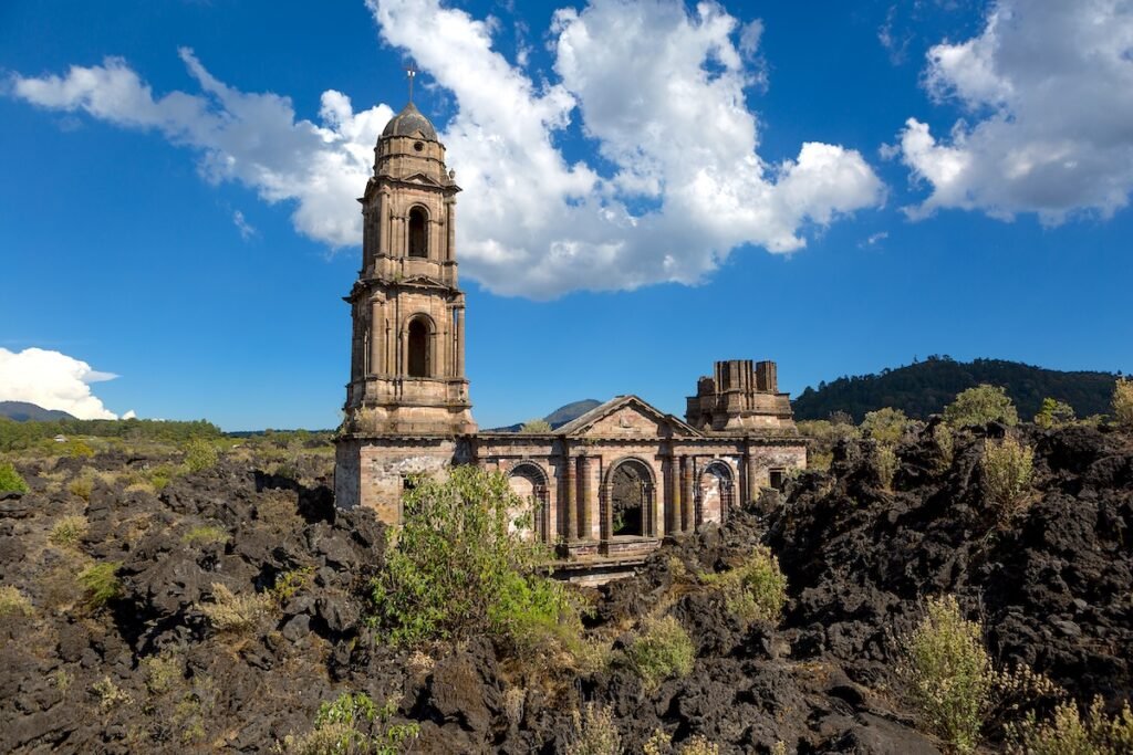San Juan Parangaricutiro Church covered by lava flow from the Paricutin volcano in Mexico 7 Natural Wonders