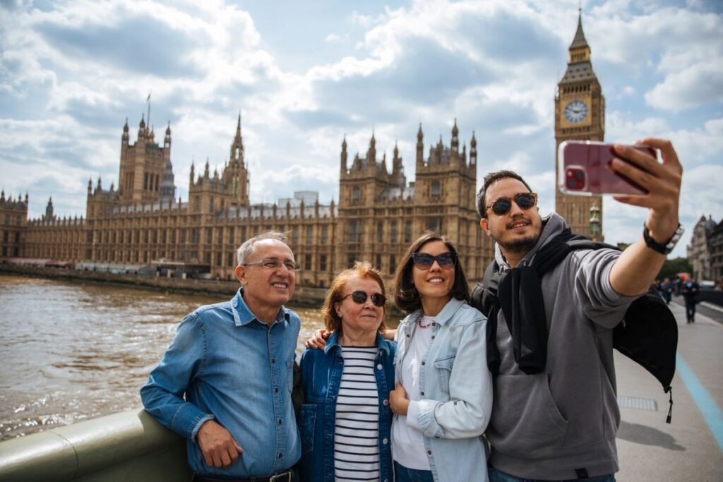 family selfie big ben london Expedia vs Travelocity,travelocity