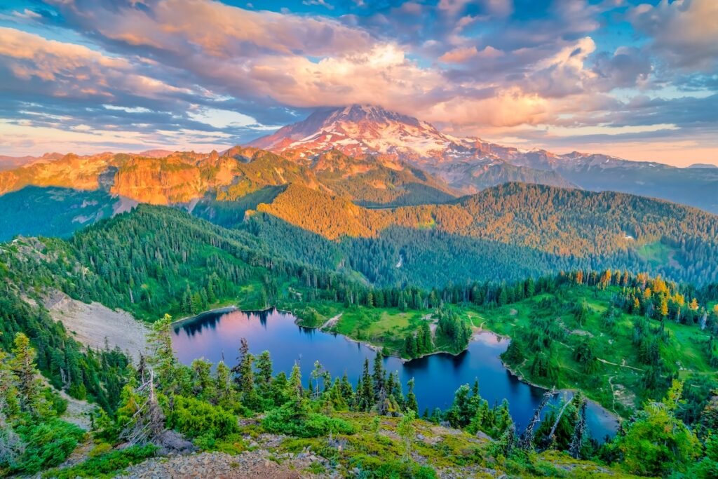 Washington State's Mount Rainier Scenic Railroad Mount Rainier and Eunice Lake as seen from Tolmie Peak in Washington state, USA at sunset time.
