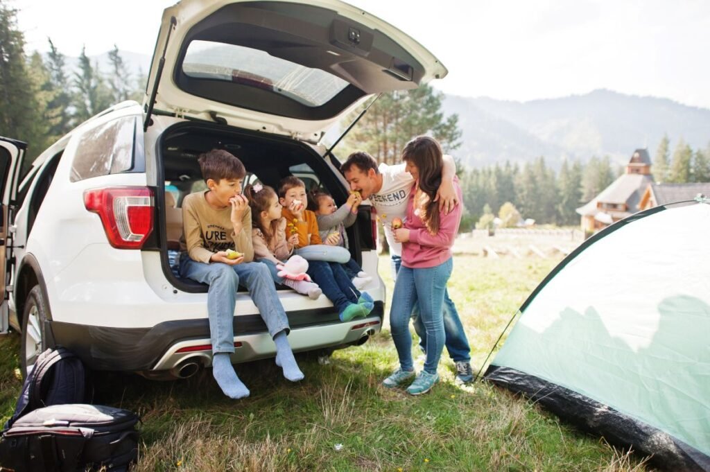 family camping car boot mountains usa budget vacation budget travel apps for families